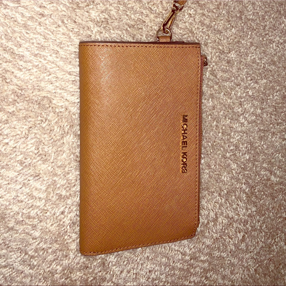 KORS wristlet/phone wallet luggage & goldtone.EUC